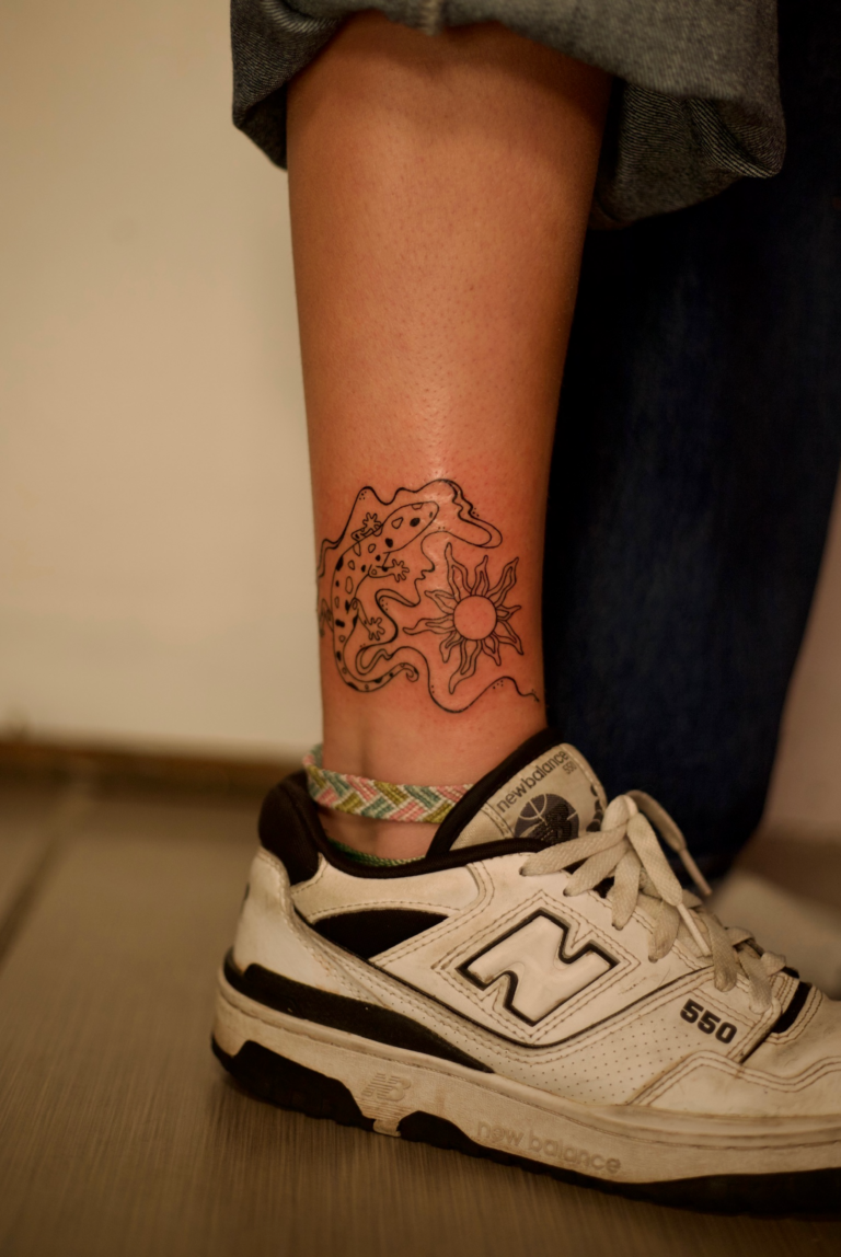 Swirly Ankle Tattoo With Sun and Lizard