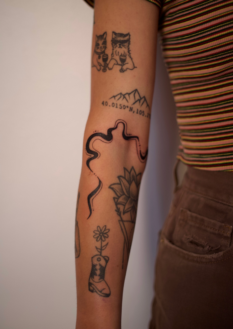 Freehand Swirly Elbow Wrap Tattoo