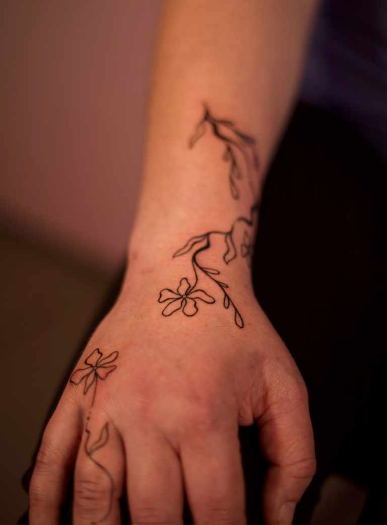 Floral Swirly Hand and Wrist Tattoos