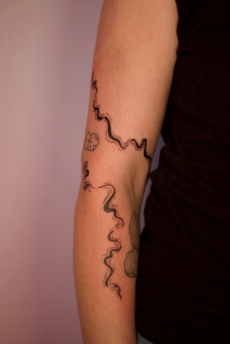 Freehand Swirly Elbow Wrap Tattoo