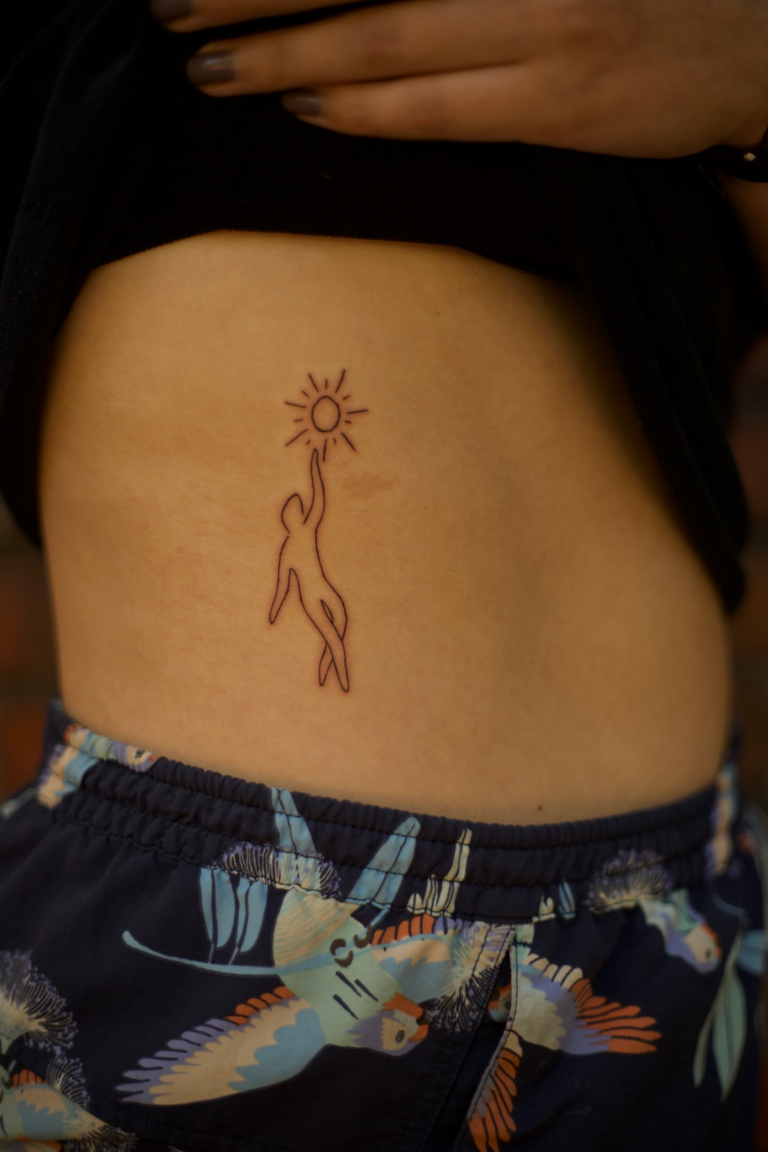 Human and Sun Tattoo