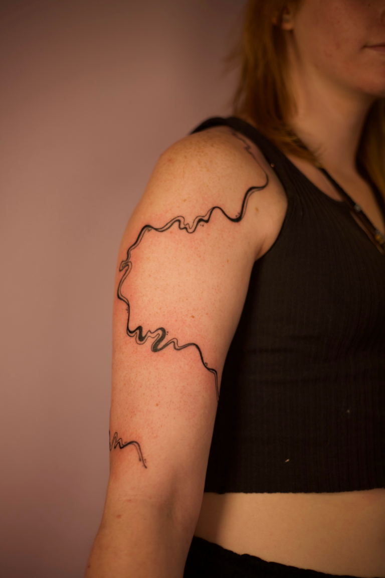 Freehand Swirly Arm Wrap Tattoo