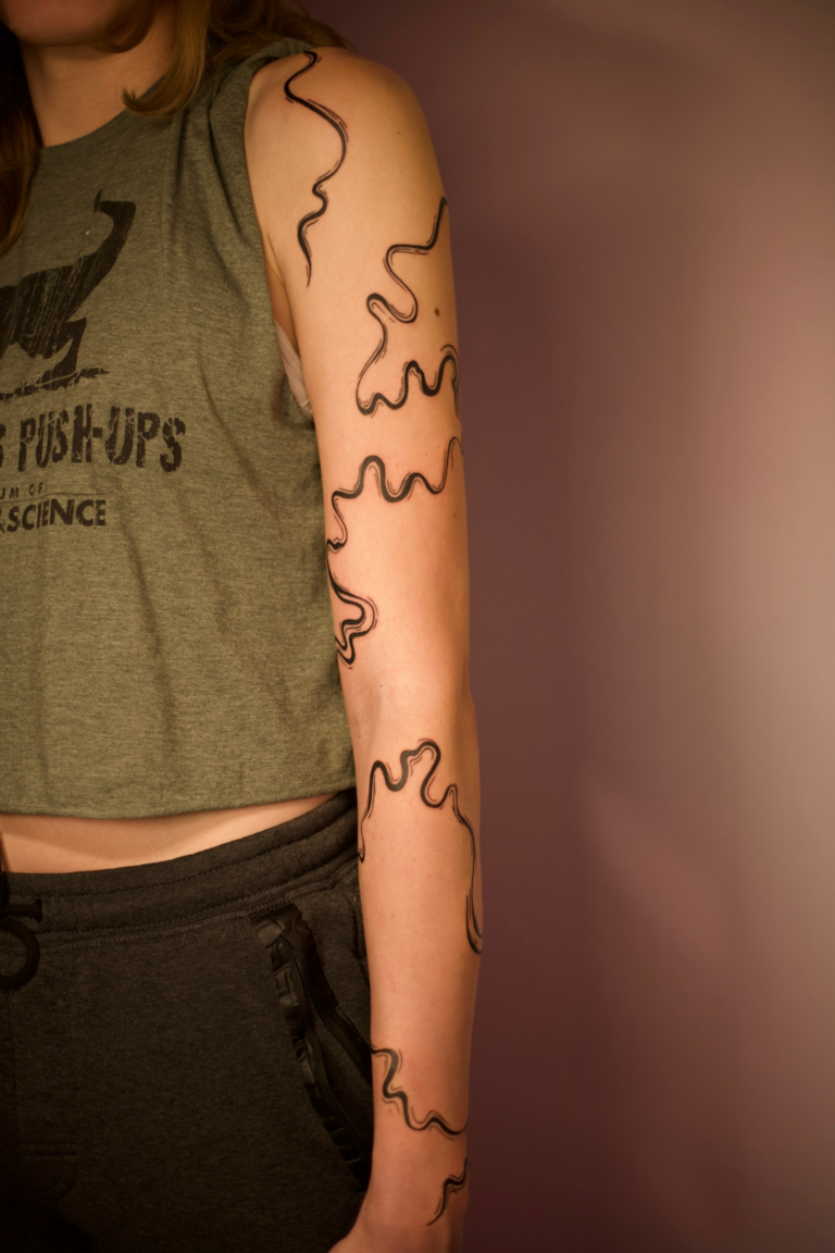 Abstract Swirly Arm Wrap Tattoo