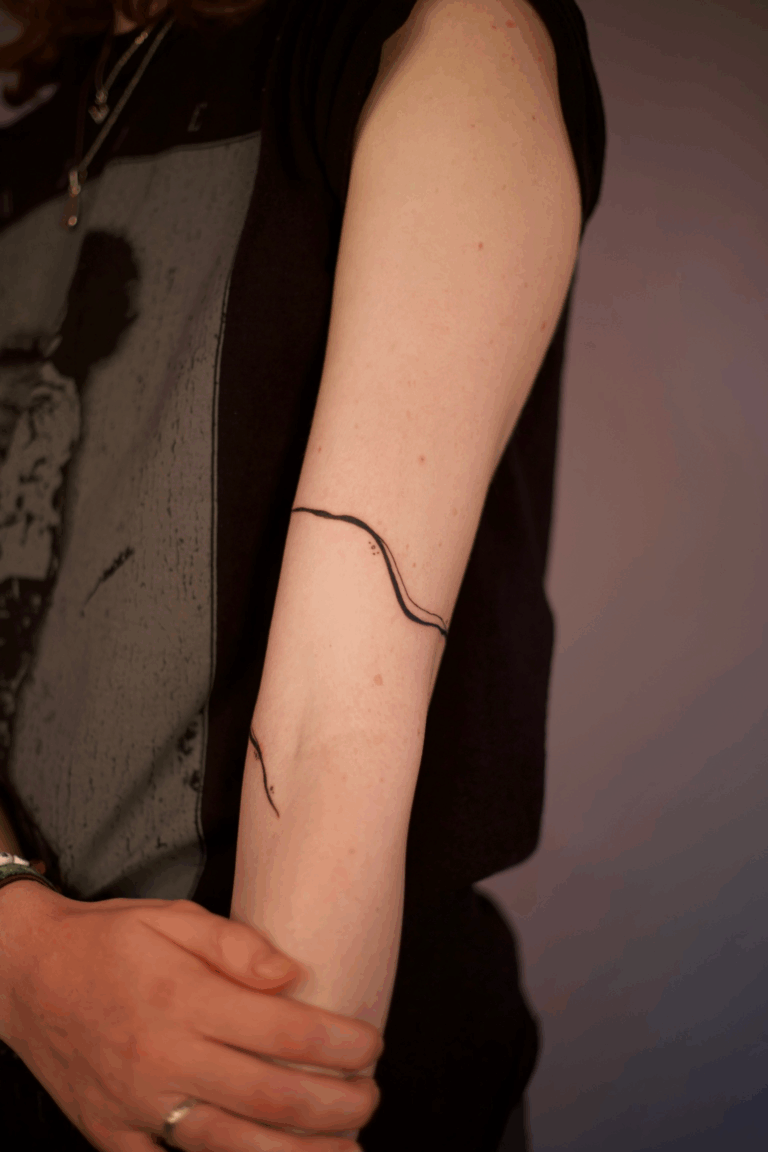 Freehand Swirly Elbow Wrap Tattoo