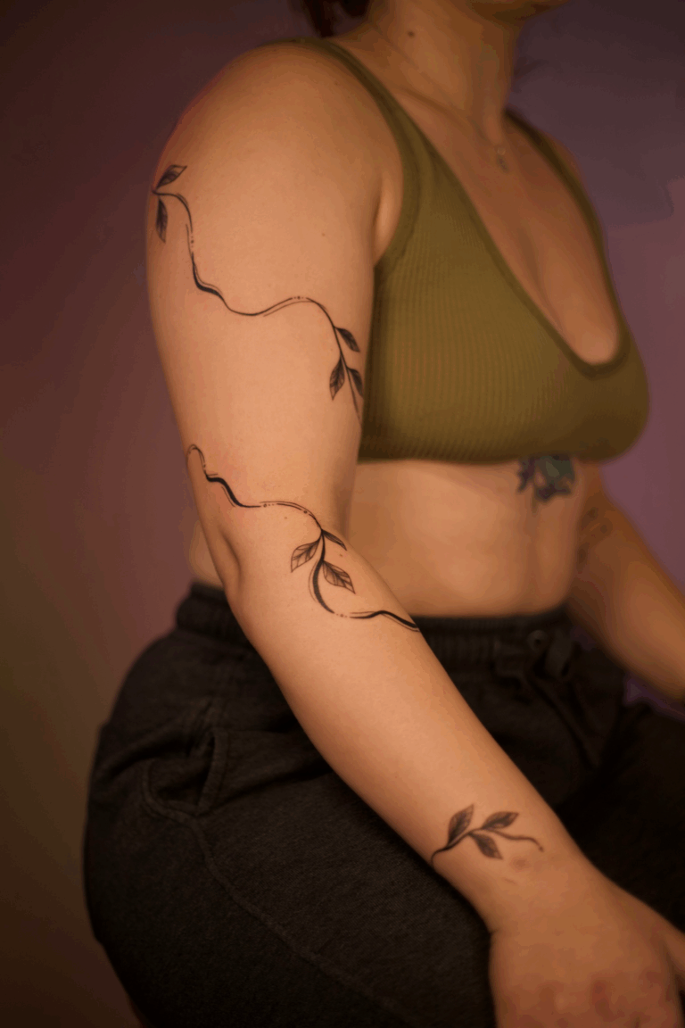 Full Arm Wrap Swirly Vines Tattoo