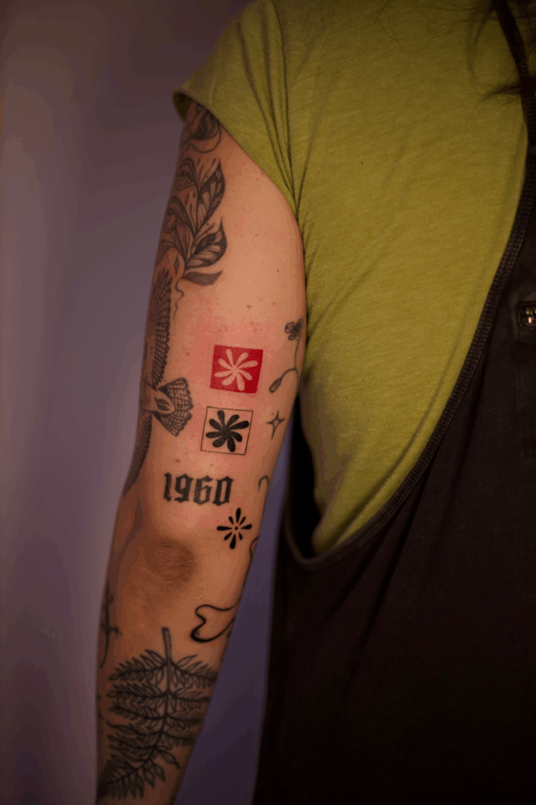 Black and Red Groovy Flowers Tattoo