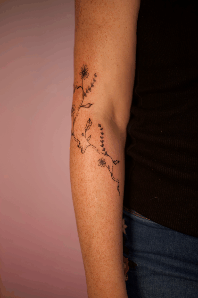 Swirly Flower Elbow Wrap Tattoo