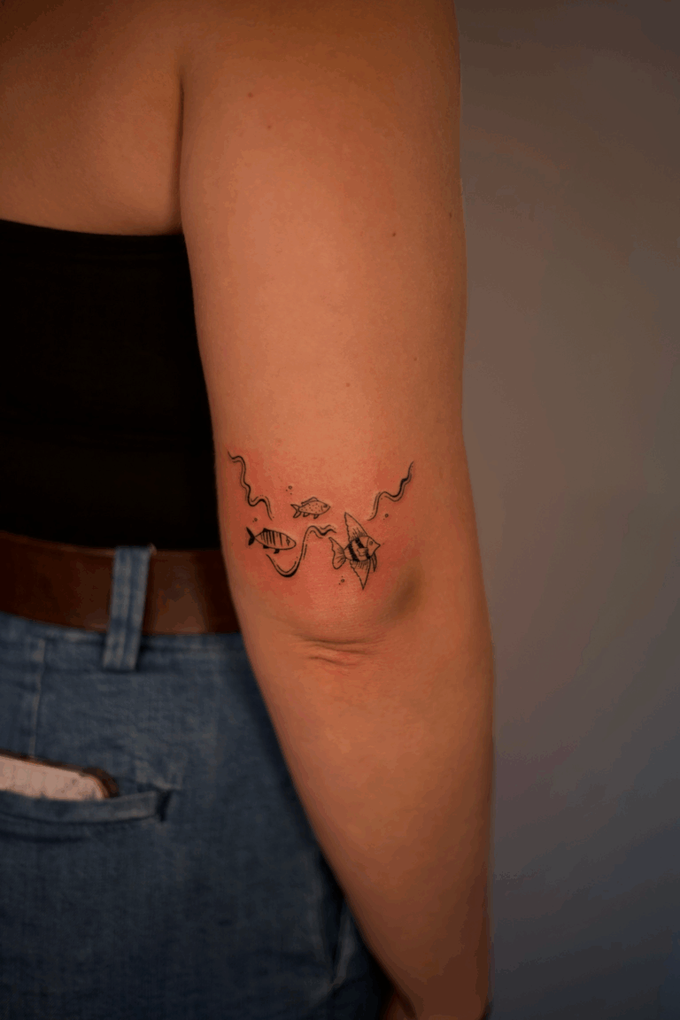 Fish and Swirlies Elbow Tattoo