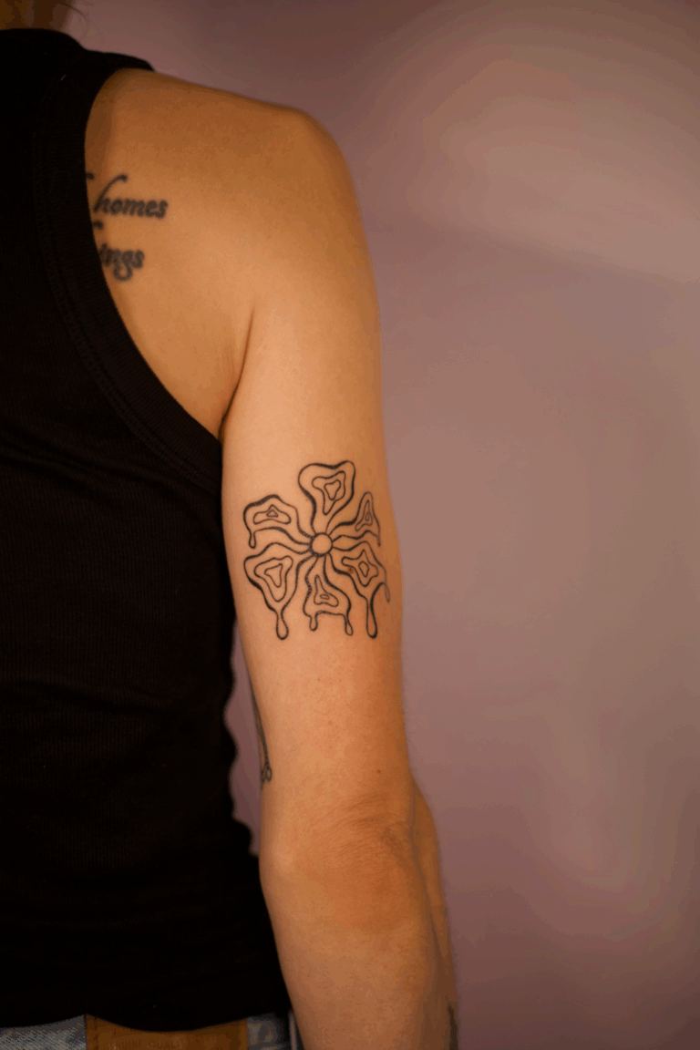 Healed Groovy Dripping Flower Tattoo